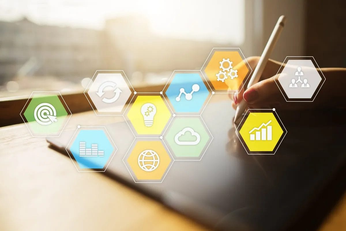 Person using digital tablet with hexagonal icons